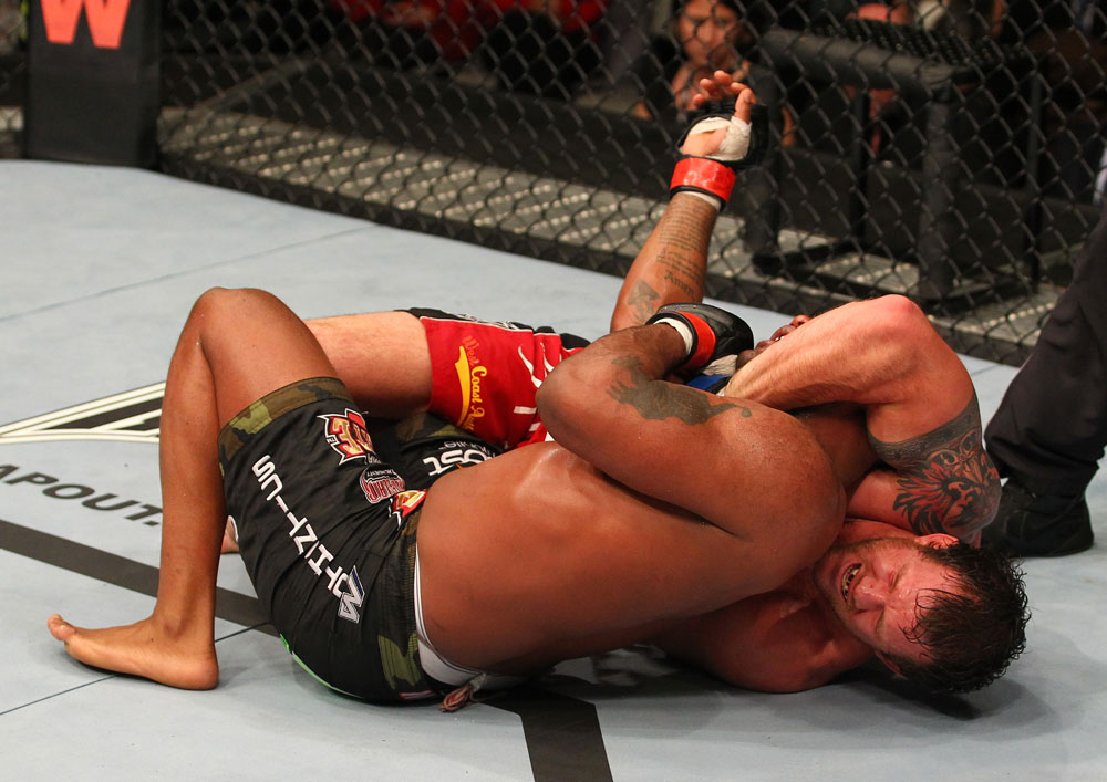 SAITAMA, JAPAN - FEBRUARY 26:  (R-L) Ryan Bader attempts a guillotine choke against Quinton "Rampage" Jackson during the UFC 144 event at Saitama Super Arena on February 26, 2012 in Saitama, Japan.  (Photo by Al Bello/Zuffa LLC/Zuffa LLC via Getty Images) *** Local Caption *** Quinton Jackson; Ryan Bader