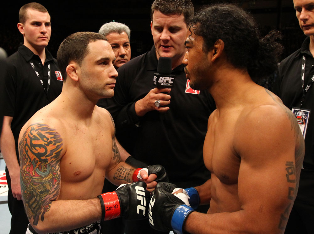 SAITAMA, JAPAN - FEBRUARY 26:  (L-R) Opponents Frankie Edgar and Benson Henderson touch gloves before their Lightweight Championship bout during the UFC 144 event at Saitama Super Arena on February 26, 2012 in Saitama, Japan.  (Photo by Al Bello/Zuffa LLC/Zuffa LLC via Getty Images) *** Local Caption *** Frankie Edgar; Benson Henderson