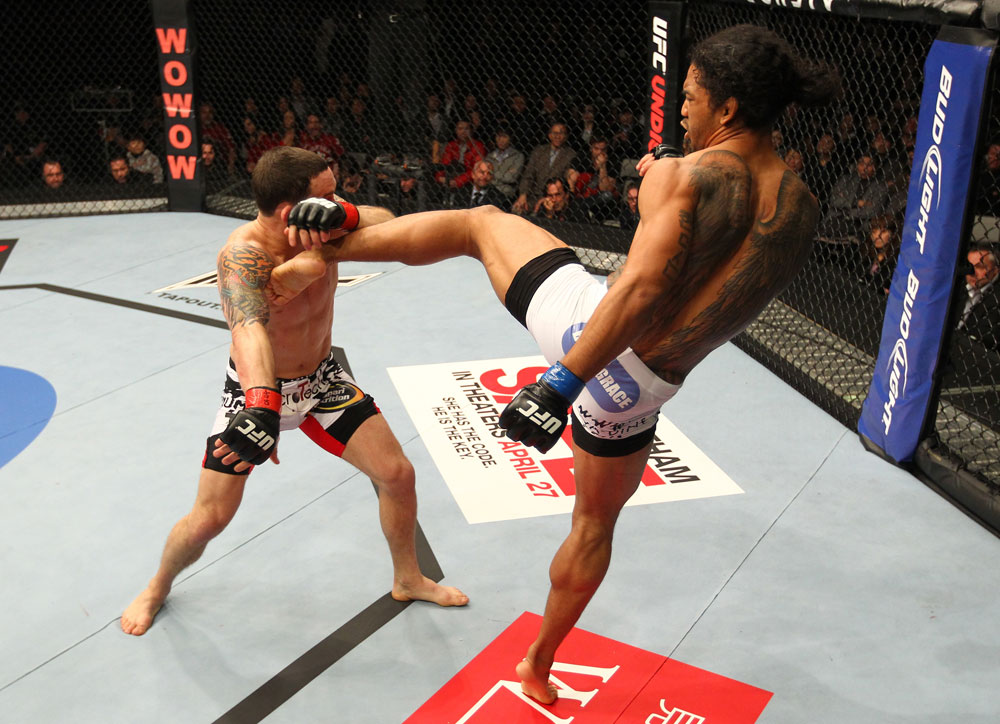 SAITAMA, JAPAN - FEBRUARY 26:  (R-L) Benson Henderson kicks Frankie Edgar during the UFC 144 event at Saitama Super Arena on February 26, 2012 in Saitama, Japan.  (Photo by Al Bello/Zuffa LLC/Zuffa LLC via Getty Images) *** Local Caption *** Frankie Edgar; Benson Henderson