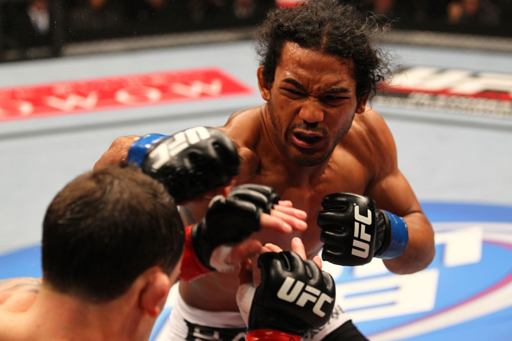 SAITAMA, JAPAN - FEBRUARY 26:  (R-L) Benson Henderson punches Frankie Edgar during the UFC 144 event at Saitama Super Arena on February 26, 2012 in Saitama, Japan.  (Photo by Al Bello/Zuffa LLC/Zuffa LLC via Getty Images) *** Local Caption *** Frankie Edgar; Benson Henderson
