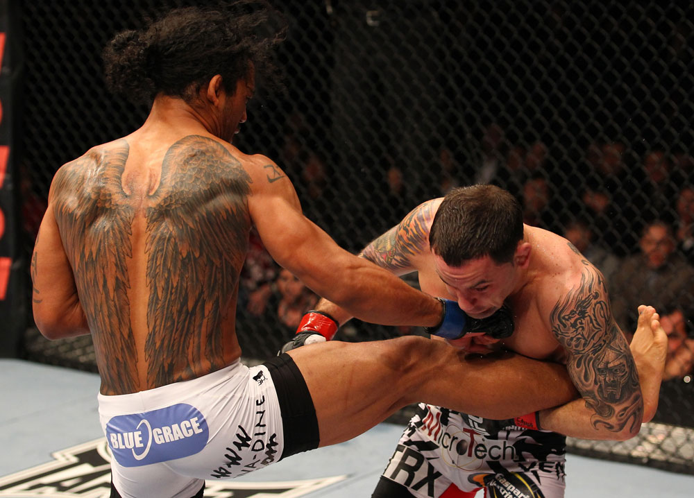 SAITAMA, JAPAN - FEBRUARY 26:  (L-R) Benson Henderson punches Frankie Edgar during the UFC 144 event at Saitama Super Arena on February 26, 2012 in Saitama, Japan.  (Photo by Al Bello/Zuffa LLC/Zuffa LLC via Getty Images) *** Local Caption *** Frankie Edgar; Benson Henderson