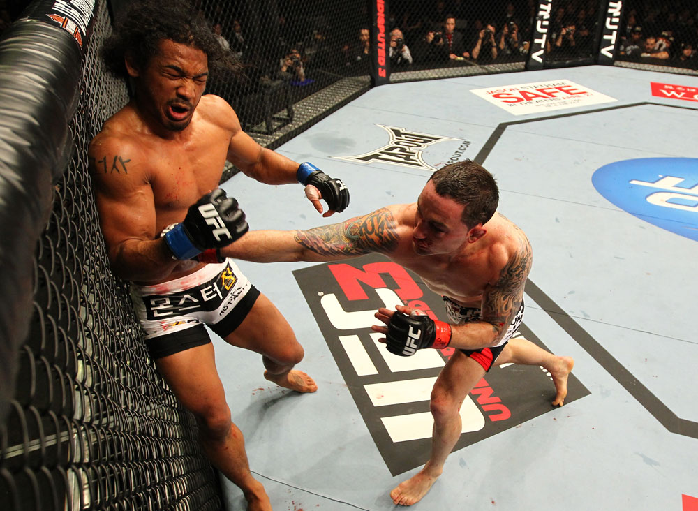 SAITAMA, JAPAN - FEBRUARY 26:  (R-L) Frankie Edgar punches Benson Henderson during the UFC 144 event at Saitama Super Arena on February 26, 2012 in Saitama, Japan.  (Photo by Al Bello/Zuffa LLC/Zuffa LLC via Getty Images) *** Local Caption *** Frankie Edgar; Benson Henderson