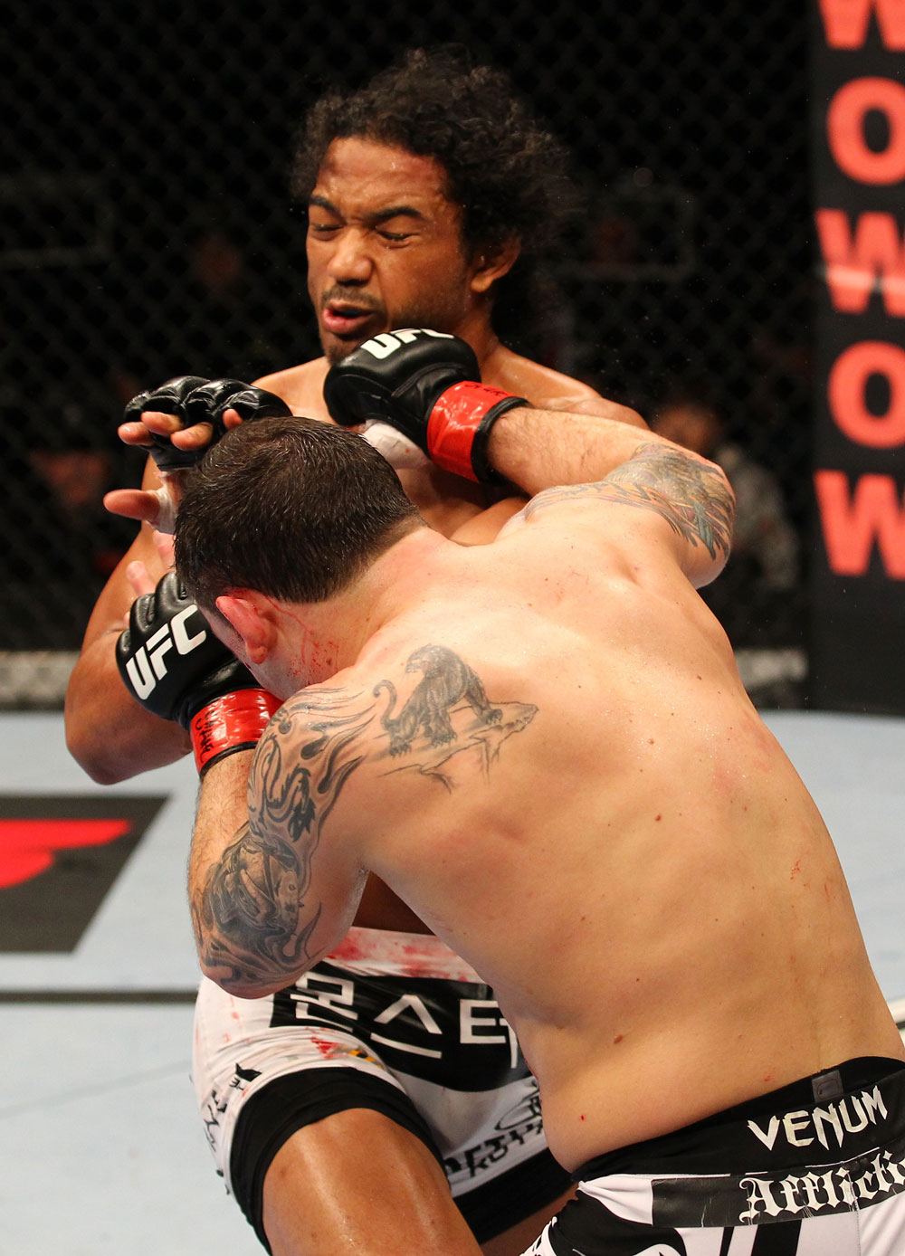 SAITAMA, JAPAN - FEBRUARY 26:  (R-L) Frankie Edgar punches Benson Henderson during the UFC 144 event at Saitama Super Arena on February 26, 2012 in Saitama, Japan.  (Photo by Al Bello/Zuffa LLC/Zuffa LLC via Getty Images) *** Local Caption *** Frankie Edgar; Benson Henderson