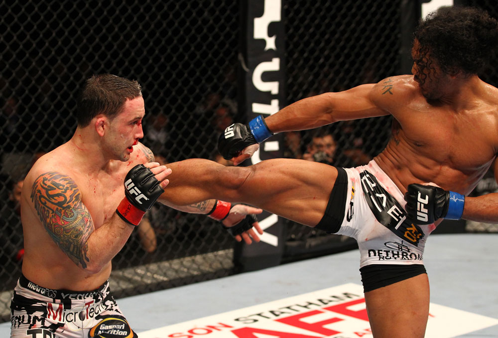 SAITAMA, JAPAN - FEBRUARY 26:  (R-L) Benson Henderson kicks Frankie Edgar during the UFC 144 event at Saitama Super Arena on February 26, 2012 in Saitama, Japan.  (Photo by Al Bello/Zuffa LLC/Zuffa LLC via Getty Images) *** Local Caption *** Frankie Edgar; Benson Henderson