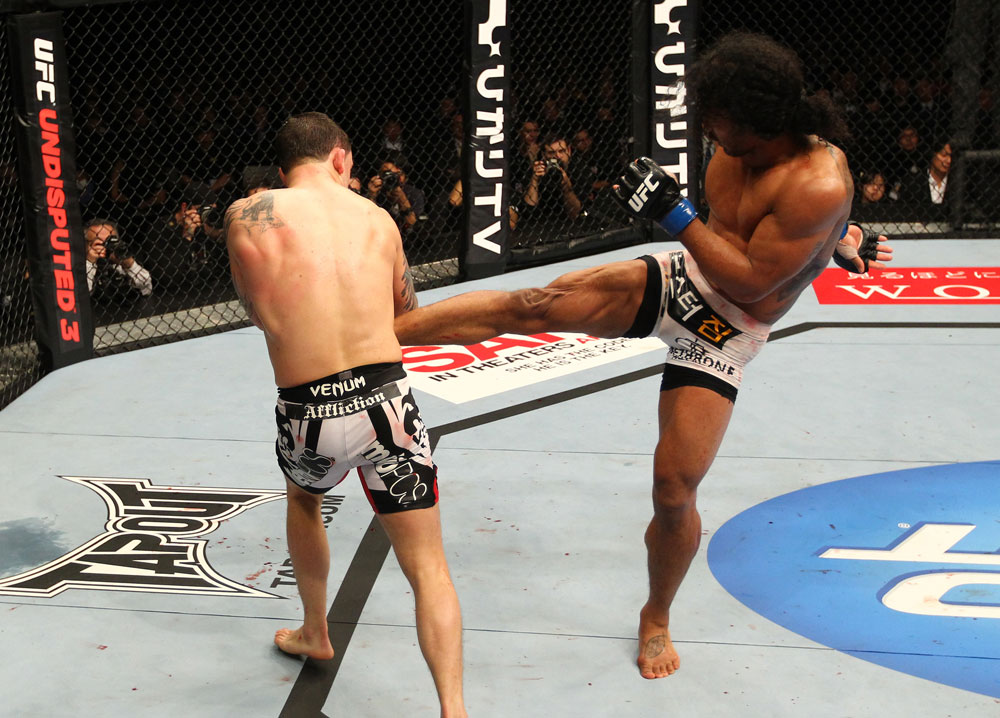 SAITAMA, JAPAN - FEBRUARY 26:  (R-L) Benson Henderson kicks Frankie Edgar during the UFC 144 event at Saitama Super Arena on February 26, 2012 in Saitama, Japan.  (Photo by Al Bello/Zuffa LLC/Zuffa LLC via Getty Images) *** Local Caption *** Frankie Edgar; Benson Henderson