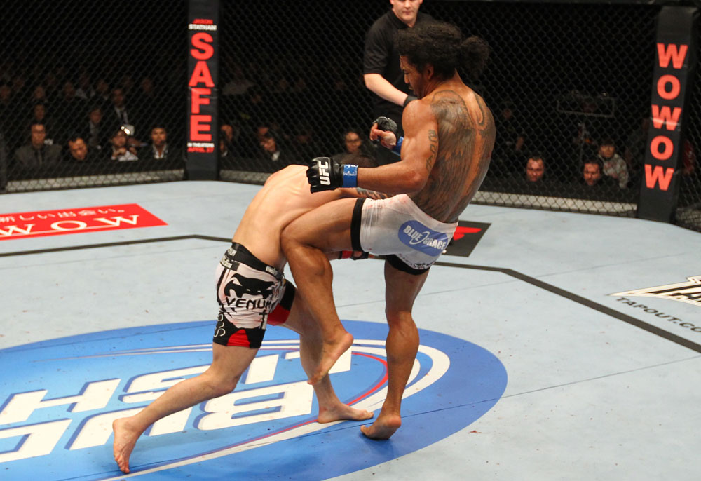 SAITAMA, JAPAN - FEBRUARY 26:  (R-L) Benson Henderson delivers a knee strike against Frankie Edgar during the UFC 144 event at Saitama Super Arena on February 26, 2012 in Saitama, Japan.  (Photo by Al Bello/Zuffa LLC/Zuffa LLC via Getty Images) *** Local Caption *** Frankie Edgar; Benson Henderson