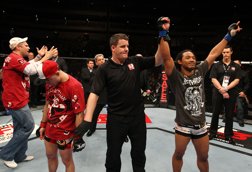 SAITAMA, JAPAN - FEBRUARY 26:  Benson Henderson (R) reacts after defeating Frankie Edgar (L) to win the UFC Lightweight Championship during the UFC 144 event at Saitama Super Arena on February 26, 2012 in Saitama, Japan.  (Photo by Al Bello/Zuffa LLC/Zuffa LLC via Getty Images) *** Local Caption *** Benson Henderson; Frankie Edgar