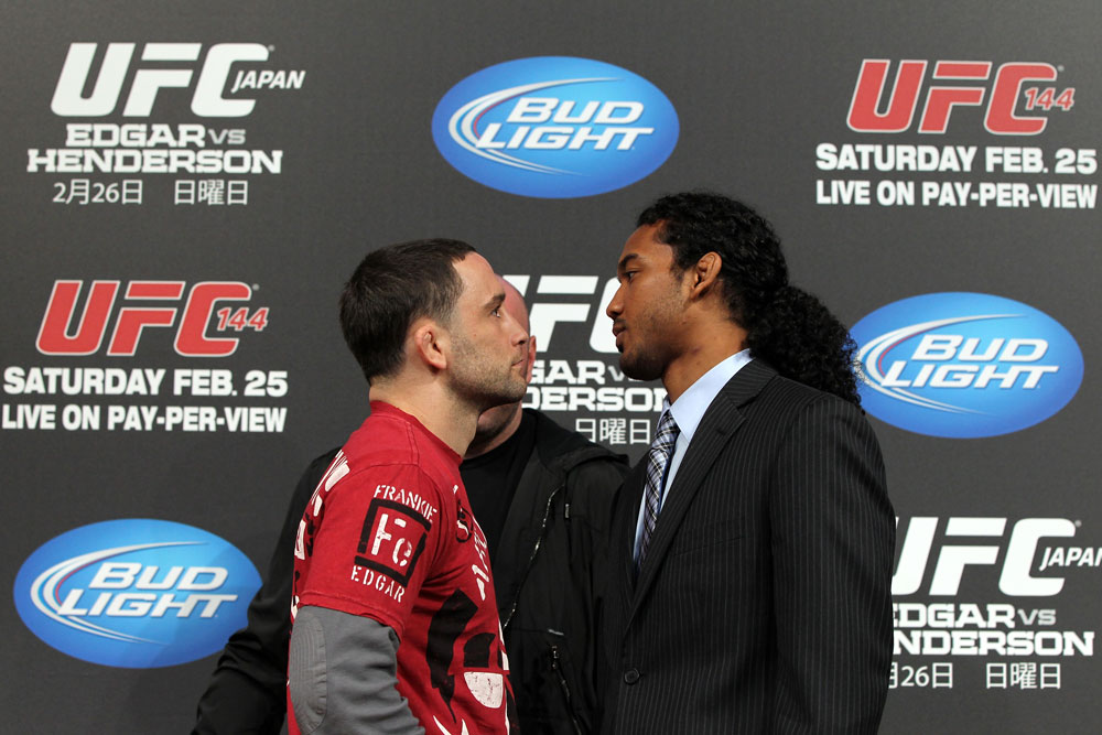 TOKYO, JAPAN - FEBRUARY 23: (L-R) UFC Lightweight Champion Frankie Edgar and challenger Benson Henderson face off at the final UFC 144 pre-fight press conference at the Ritz-Carlton Hotel on February 23, 2012 in Tokyo, Japan. (Photo by Josh Hedges/Zuffa LLC/Zuffa LLC via Getty Images) *** Local Caption *** Frankie Edgar; Benson Henderson