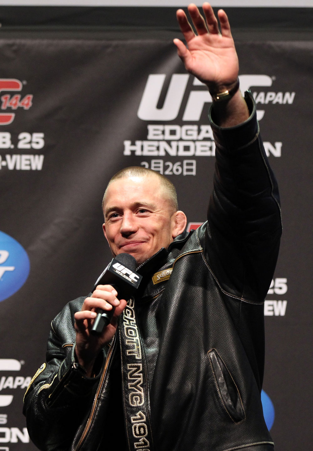 SAITAMA, JAPAN - FEBRUARY 25: UFC Welterweight Champion Georges St-Pierre takes part in a Q&A session before the official UFC 144 weigh in at the Saitama Super Arena on February 25, 2012 in Saitama, Japan. (Photo by Josh Hedges/Zuffa LLC/Zuffa LLC via Getty Images) *** Local Caption *** Georges St-Pierre