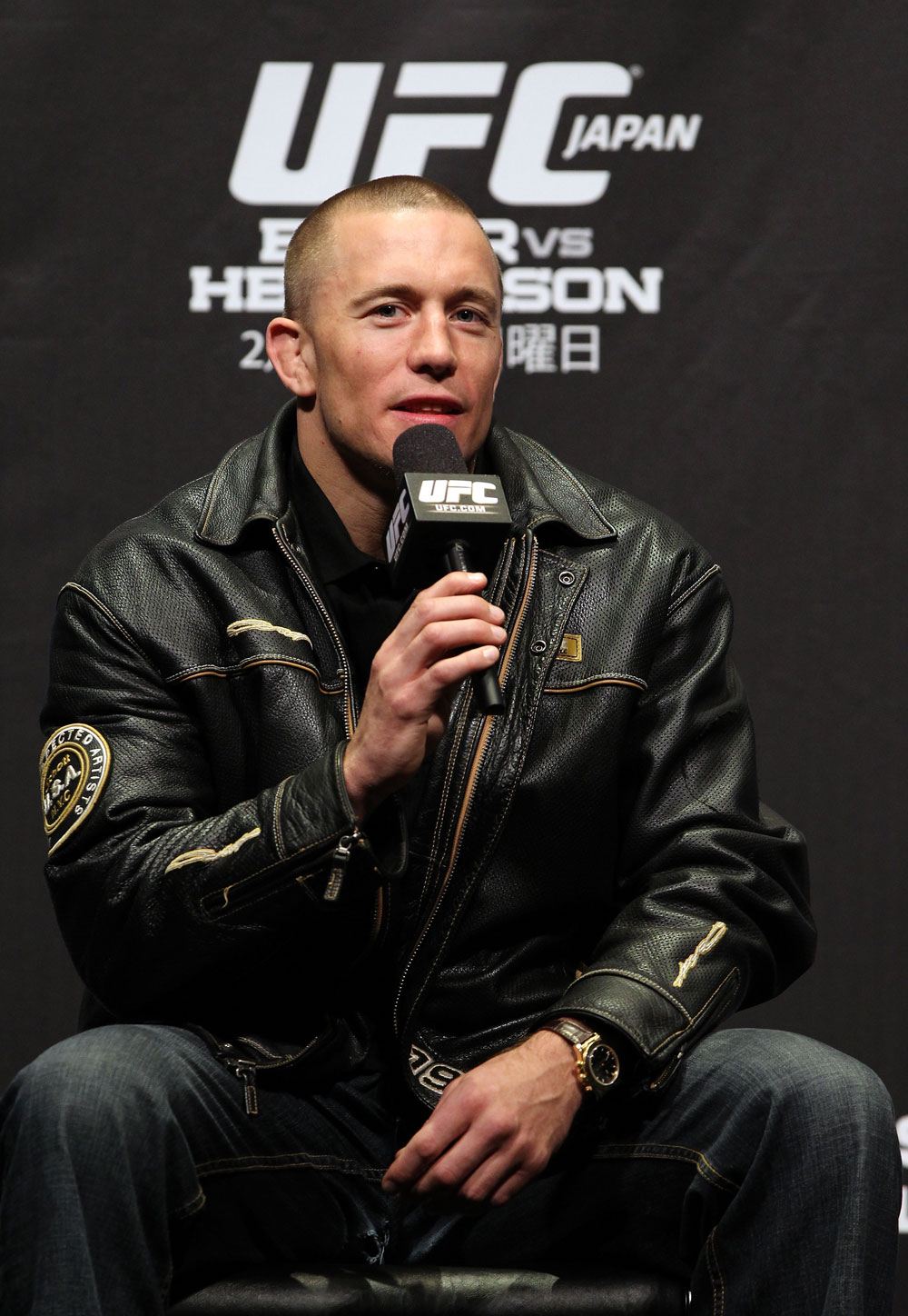 SAITAMA, JAPAN - FEBRUARY 25: UFC Welterweight Champion Georges St-Pierre takes part in a Q&A session before the official UFC 144 weigh in at the Saitama Super Arena on February 25, 2012 in Saitama, Japan. (Photo by Josh Hedges/Zuffa LLC/Zuffa LLC via Getty Images) *** Local Caption *** Georges St-Pierre