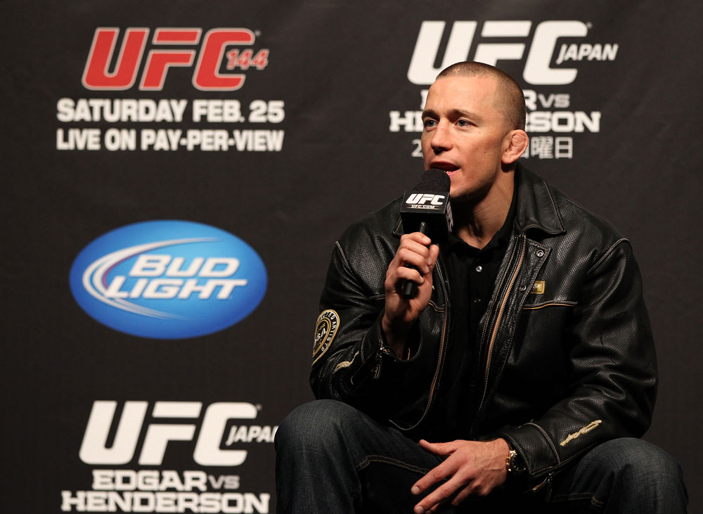 SAITAMA, JAPAN - FEBRUARY 25: UFC Welterweight Champion Georges St-Pierre takes part in a Q&A session before the official UFC 144 weigh in at the Saitama Super Arena on February 25, 2012 in Saitama, Japan. (Photo by Josh Hedges/Zuffa LLC/Zuffa LLC via Getty Images) *** Local Caption *** Georges St-Pierre
