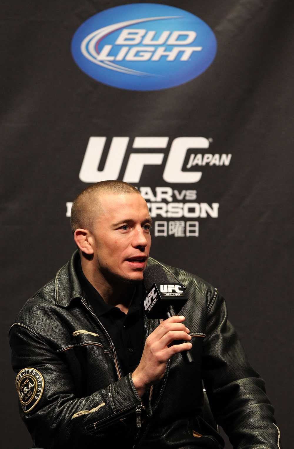 SAITAMA, JAPAN - FEBRUARY 25: UFC Welterweight Champion Georges St-Pierre takes part in a Q&A session before the official UFC 144 weigh in at the Saitama Super Arena on February 25, 2012 in Saitama, Japan. (Photo by Josh Hedges/Zuffa LLC/Zuffa LLC via Getty Images) *** Local Caption *** Georges St-Pierre