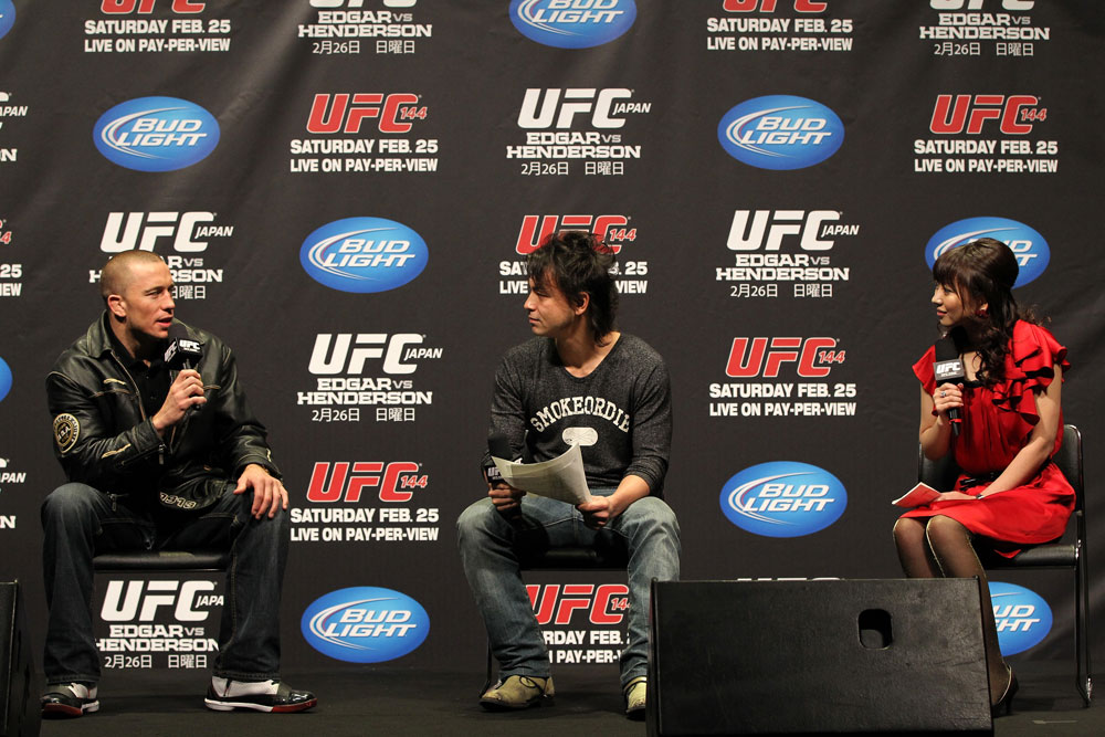 SAITAMA, JAPAN - FEBRUARY 25: UFC Welterweight Champion Georges St-Pierre (L) takes part in a Q&A session before the official UFC 144 weigh in at the Saitama Super Arena on February 25, 2012 in Saitama, Japan. (Photo by Josh Hedges/Zuffa LLC/Zuffa LLC via Getty Images) *** Local Caption *** Georges St-Pierre