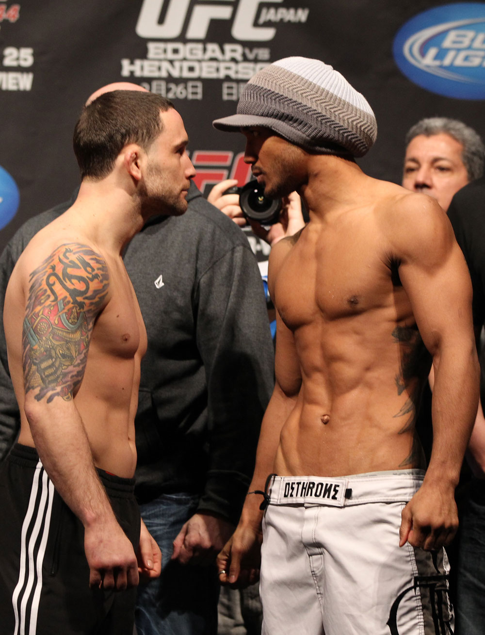 SAITAMA, JAPAN - FEBRUARY 25: (L-R) UFC Lightweight Champion Frankie Edgar and challenger Benson Henderson face off after weighing in during the official UFC 144 weigh in at the Saitama Super Arena on February 25, 2012 in Saitama, Japan. (Photo by Josh Hedges/Zuffa LLC/Zuffa LLC via Getty Images) *** Local Caption *** Benson Henderson; Frankie Edgar