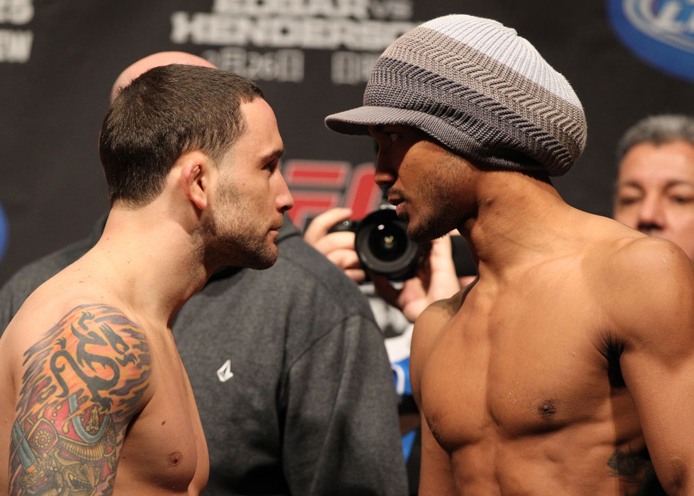 SAITAMA, JAPAN - FEBRUARY 25: (L-R) UFC Lightweight Champion Frankie Edgar and challenger Benson Henderson face off after weighing in during the official UFC 144 weigh in at the Saitama Super Arena on February 25, 2012 in Saitama, Japan. (Photo by Josh Hedges/Zuffa LLC/Zuffa LLC via Getty Images) *** Local Caption *** Benson Henderson; Frankie Edgar