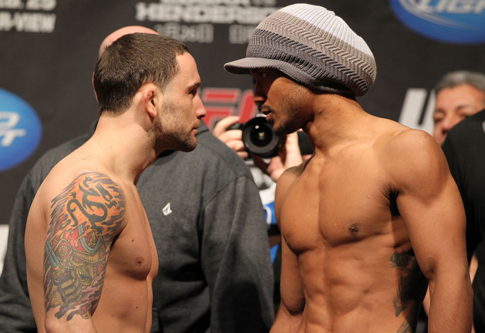 SAITAMA, JAPAN - FEBRUARY 25: (L-R) UFC Lightweight Champion Frankie Edgar and challenger Benson Henderson face off after weighing in during the official UFC 144 weigh in at the Saitama Super Arena on February 25, 2012 in Saitama, Japan. (Photo by Josh Hedges/Zuffa LLC/Zuffa LLC via Getty Images) *** Local Caption *** Benson Henderson; Frankie Edgar
