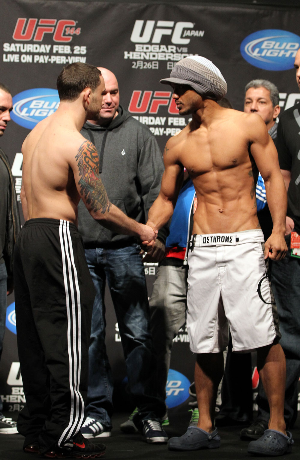 SAITAMA, JAPAN - FEBRUARY 25: (L-R) UFC Lightweight Champion Frankie Edgar and challenger Benson Henderson shake hands after weighing in during the official UFC 144 weigh in at the Saitama Super Arena on February 25, 2012 in Saitama, Japan. (Photo by Josh Hedges/Zuffa LLC/Zuffa LLC via Getty Images) *** Local Caption *** Benson Henderson; Frankie Edgar