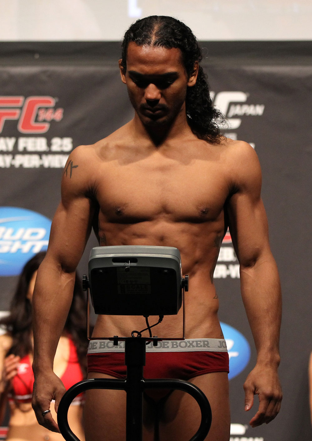 SAITAMA, JAPAN - FEBRUARY 25: UFC Lightweight title challenger Benson Henderson weighs in during the official UFC 144 weigh in at the Saitama Super Arena on February 25, 2012 in Saitama, Japan. (Photo by Josh Hedges/Zuffa LLC/Zuffa LLC via Getty Images) *** Local Caption *** Benson Henderson