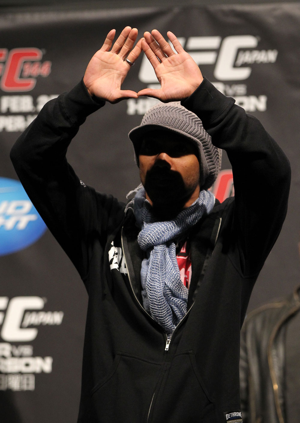 SAITAMA, JAPAN - FEBRUARY 25: UFC Lightweight title challenger Benson Henderson enters the arena before weighing in during the official UFC 144 weigh in at the Saitama Super Arena on February 25, 2012 in Saitama, Japan. (Photo by Josh Hedges/Zuffa LLC/Zuffa LLC via Getty Images) *** Local Caption *** Benson Henderson