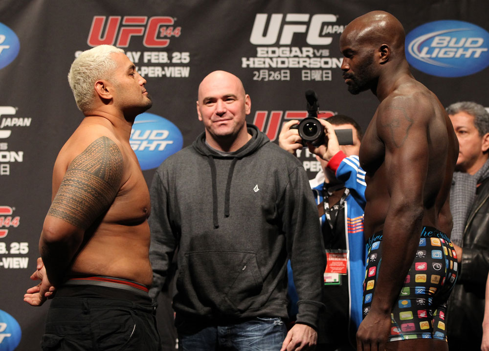SAITAMA, JAPAN - FEBRUARY 25: (L-R) Heavyweight opponents Mark Hunt and Cheick Kongo face off after weighing in during the official UFC 144 weigh in at the Saitama Super Arena on February 25, 2012 in Saitama, Japan. (Photo by Josh Hedges/Zuffa LLC/Zuffa LLC via Getty Images) *** Local Caption *** Mark Hunt; Cheick Kongo; Dana White