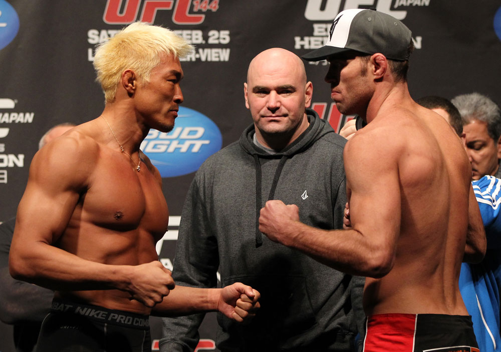 SAITAMA, JAPAN - FEBRUARY 25: (L-R) Welterweight opponents Yoshihiro Akiyama and Jake Shields face off after weighing in during the official UFC 144 weigh in at the Saitama Super Arena on February 25, 2012 in Saitama, Japan. (Photo by Josh Hedges/Zuffa LLC/Zuffa LLC via Getty Images) *** Local Caption *** Yoshihiro Akiyama; Jake Shields; Dana White