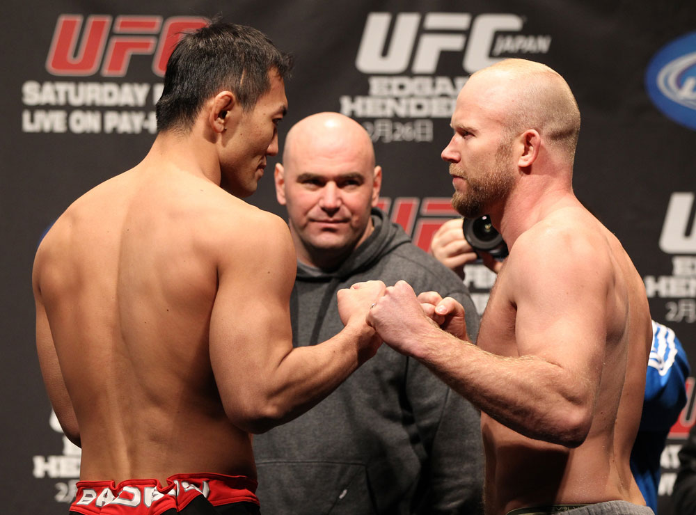 SAITAMA, JAPAN - FEBRUARY 25: (L-R) Middleweight opponents Yushin Okami and Tim Boetsch face off after weighing in during the official UFC 144 weigh in at the Saitama Super Arena on February 25, 2012 in Saitama, Japan. (Photo by Josh Hedges/Zuffa LLC/Zuffa LLC via Getty Images) *** Local Caption *** Yushin Okami; Tim Boetsch; Dana White