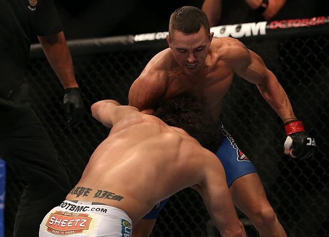 TORONTO, CANADA - SEPTEMBER 22: (R-L) Kyle Noke knocks out Charlie Brenneman with a punch during their welterweight bout at UFC 152 inside Air Canada Centre on September 22, 2012 in Toronto, Ontario, Canada. (Photo by Josh Hedges/Zuffa LLC/Zuffa LLC via Getty Images)