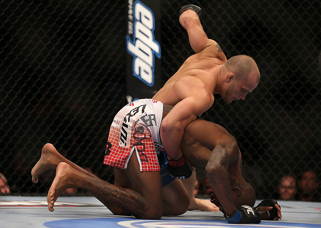 TORONTO, CANADA - SEPTEMBER 22: Mitch Gagnon (top) punches down at Walel Watson during their bantamweight bout at UFC 152 inside Air Canada Centre on September 22, 2012 in Toronto, Ontario, Canada. (Photo by Josh Hedges/Zuffa LLC/Zuffa LLC via Getty Images)