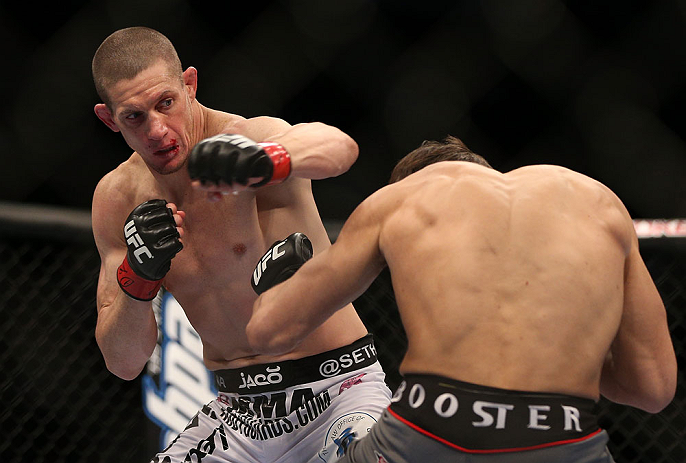 TORONTO, CANADA - SEPTEMBER 22: (L-R) Seth Baczynski punches Simeon Thoresen during their welterweight bout at UFC 152 inside Air Canada Centre on September 22, 2012 in Toronto, Ontario, Canada. (Photo by Josh Hedges/Zuffa LLC/Zuffa LLC via Getty Images)