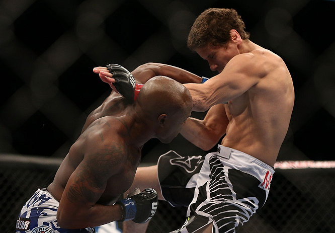 TORONTO, CANADA - SEPTEMBER 22: (L-R) Marcus Brimage punches Jimy Hettes during their featherweight bout at UFC 152 inside Air Canada Centre on September 22, 2012 in Toronto, Ontario, Canada. (Photo by Josh Hedges/Zuffa LLC/Zuffa LLC via Getty Images)