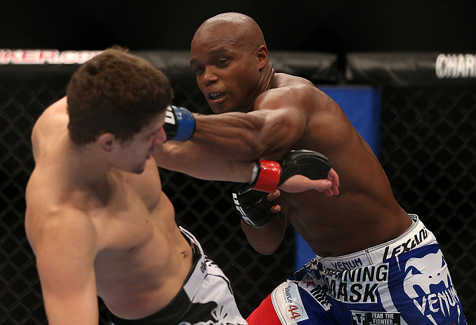 TORONTO, CANADA - SEPTEMBER 22: (R-L) Marcus Brimage punches Jimy Hettes during their featherweight bout at UFC 152 inside Air Canada Centre on September 22, 2012 in Toronto, Ontario, Canada. (Photo by Josh Hedges/Zuffa LLC/Zuffa LLC via Getty Images)