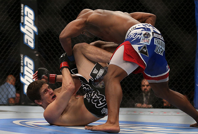TORONTO, CANADA - SEPTEMBER 22: (R-L) Marcus Brimage punches Jimy Hettes during their featherweight bout at UFC 152 inside Air Canada Centre on September 22, 2012 in Toronto, Ontario, Canada. (Photo by Josh Hedges/Zuffa LLC/Zuffa LLC via Getty Images)