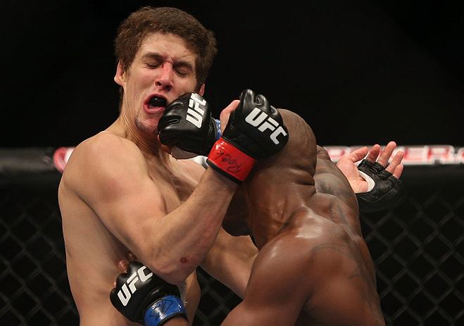 TORONTO, CANADA - SEPTEMBER 22: (R-L) Marcus Brimage punches Jimy Hettes during their featherweight bout at UFC 152 inside Air Canada Centre on September 22, 2012 in Toronto, Ontario, Canada. (Photo by Josh Hedges/Zuffa LLC/Zuffa LLC via Getty Images)