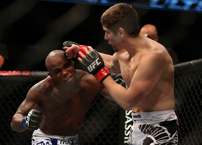TORONTO, CANADA - SEPTEMBER 22: (R-L) Jimy Hettes punches Marcus Brimage during their featherweight bout at UFC 152 inside Air Canada Centre on September 22, 2012 in Toronto, Ontario, Canada. (Photo by Josh Hedges/Zuffa LLC/Zuffa LLC via Getty Images)