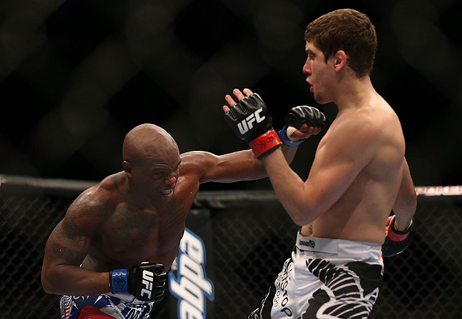 TORONTO, CANADA - SEPTEMBER 22: (L-R) Marcus Brimage punches Jimy Hettes during their featherweight bout at UFC 152 inside Air Canada Centre on September 22, 2012 in Toronto, Ontario, Canada. (Photo by Josh Hedges/Zuffa LLC/Zuffa LLC via Getty Images)