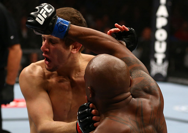 TORONTO, CANADA - SEPTEMBER 22: (R-L) Marcus Brimage punches Jimy Hettes during their featherweight bout at UFC 152 inside Air Canada Centre on September 22, 2012 in Toronto, Ontario, Canada. (Photo by Al Bello/Zuffa LLC/Zuffa LLC via Getty Images)
