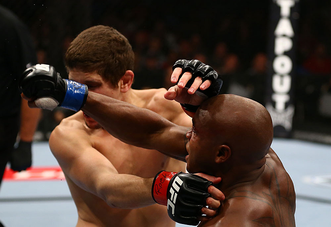 TORONTO, CANADA - SEPTEMBER 22: (R-L) Marcus Brimage punches Jimy Hettes during their featherweight bout at UFC 152 inside Air Canada Centre on September 22, 2012 in Toronto, Ontario, Canada. (Photo by Al Bello/Zuffa LLC/Zuffa LLC via Getty Images)