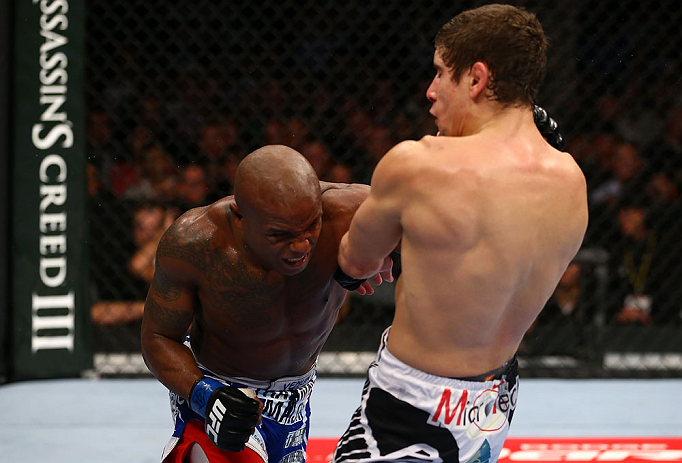 TORONTO, CANADA - SEPTEMBER 22: (L-R) Marcus Brimage punches Jimy Hettes during their featherweight bout at UFC 152 inside Air Canada Centre on September 22, 2012 in Toronto, Ontario, Canada. (Photo by Al Bello/Zuffa LLC/Zuffa LLC via Getty Images)