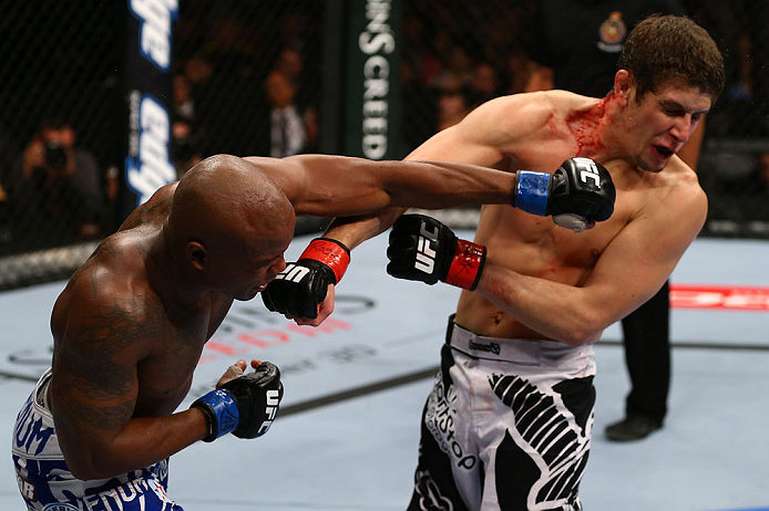 TORONTO, CANADA - SEPTEMBER 22: (L-R) Marcus Brimage punches Jimy Hettes during their featherweight bout at UFC 152 inside Air Canada Centre on September 22, 2012 in Toronto, Ontario, Canada. (Photo by Al Bello/Zuffa LLC/Zuffa LLC via Getty Images)