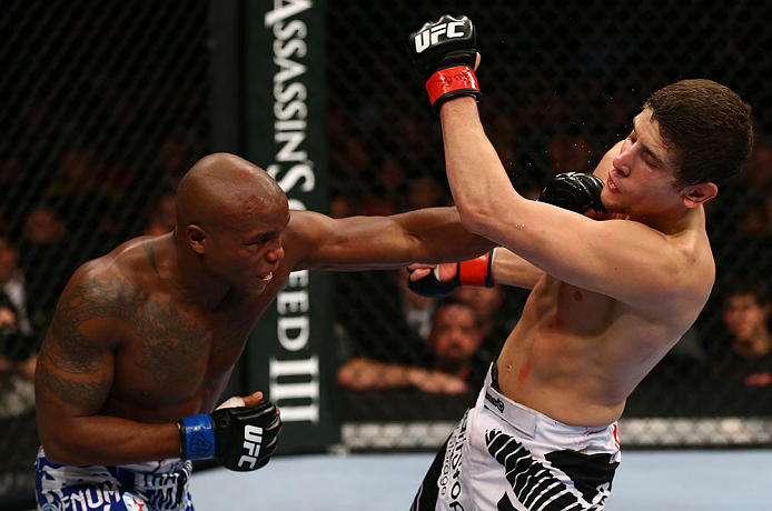TORONTO, CANADA - SEPTEMBER 22: (L-R) Marcus Brimage punches Jimy Hettes during their featherweight bout at UFC 152 inside Air Canada Centre on September 22, 2012 in Toronto, Ontario, Canada. (Photo by Al Bello/Zuffa LLC/Zuffa LLC via Getty Images)