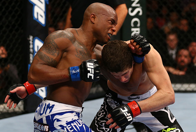 TORONTO, CANADA - SEPTEMBER 22: (L-R) Marcus Brimage punches Jimy Hettes during their featherweight bout at UFC 152 inside Air Canada Centre on September 22, 2012 in Toronto, Ontario, Canada. (Photo by Al Bello/Zuffa LLC/Zuffa LLC via Getty Images)