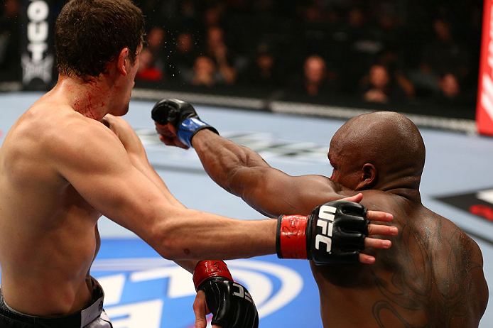TORONTO, CANADA - SEPTEMBER 22: (R-L) Marcus Brimage punches Jimy Hettes during their featherweight bout at UFC 152 inside Air Canada Centre on September 22, 2012 in Toronto, Ontario, Canada. (Photo by Al Bello/Zuffa LLC/Zuffa LLC via Getty Images)