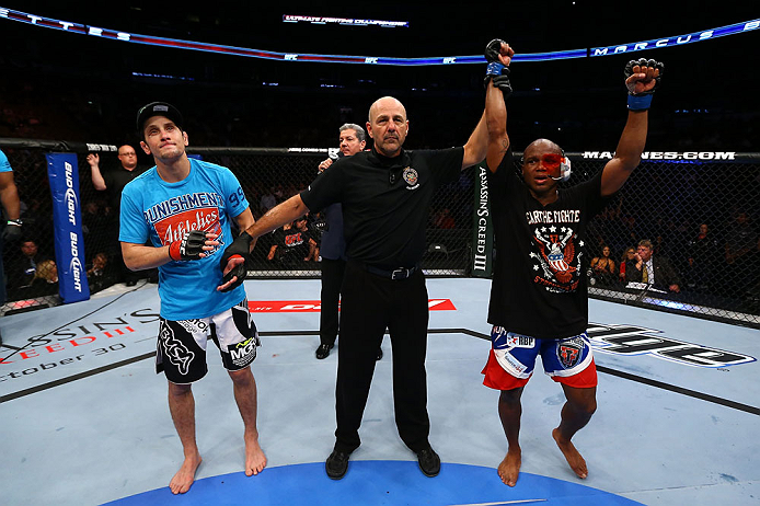 TORONTO, CANADA - SEPTEMBER 22: Marcus Brimage (R) reacts after defeating Jimy Hettes (L) during their featherweight bout at UFC 152 inside Air Canada Centre on September 22, 2012 in Toronto, Ontario, Canada. (Photo by Al Bello/Zuffa LLC/Zuffa LLC via Getty Images)