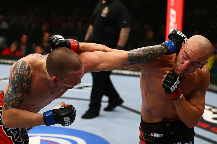 TORONTO, CANADA - SEPTEMBER 22: (L-R) Lance Benoist and Sean Pierson trade punches during their welterweight bout at UFC 152 inside Air Canada Centre on September 22, 2012 in Toronto, Ontario, Canada. (Photo by Al Bello/Zuffa LLC/Zuffa LLC via Getty Images)