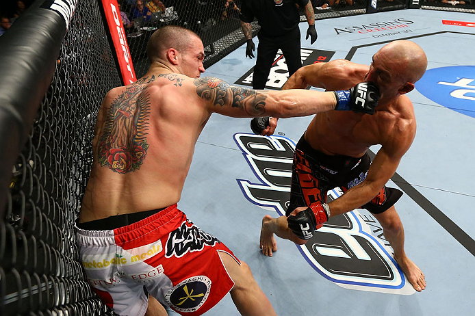 TORONTO, CANADA - SEPTEMBER 22: (L-R) Lance Benoist punches Sean Pierson during their welterweight bout at UFC 152 inside Air Canada Centre on September 22, 2012 in Toronto, Ontario, Canada. (Photo by Al Bello/Zuffa LLC/Zuffa LLC via Getty Images)