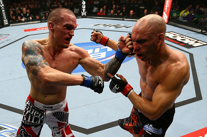 TORONTO, CANADA - SEPTEMBER 22: (L-R) Lance Benoist punches Sean Pierson during their welterweight bout at UFC 152 inside Air Canada Centre on September 22, 2012 in Toronto, Ontario, Canada. (Photo by Al Bello/Zuffa LLC/Zuffa LLC via Getty Images)