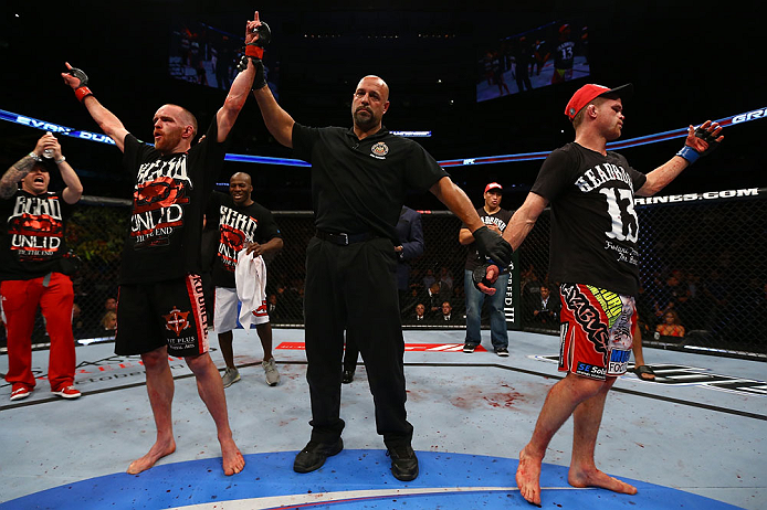 TORONTO, CANADA - SEPTEMBER 22: T.J. Grant (L) reacts after defeating Evan Dunham during their lightweight bout at UFC 152 inside Air Canada Centre on September 22, 2012 in Toronto, Ontario, Canada. (Photo by Al Bello/Zuffa LLC/Zuffa LLC via Getty Images)
