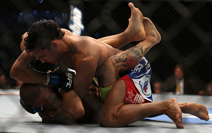 TORONTO, CANADA - SEPTEMBER 22: (R-L) Charles Oliveira delivers an elbow against Cub Swanson during their featherweight bout at UFC 152 inside Air Canada Centre on September 22, 2012 in Toronto, Ontario, Canada. (Photo by Josh Hedges/Zuffa LLC/Zuffa LLC via Getty Images)