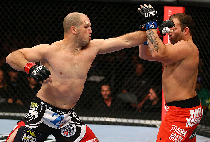 TORONTO, CANADA - SEPTEMBER 22: (L-R) Matt Hamill punches Roger Hollett during their light heavyweight bout at UFC 152 inside Air Canada Centre on September 22, 2012 in Toronto, Ontario, Canada. (Photo by Al Bello/Zuffa LLC/Zuffa LLC via Getty Images)