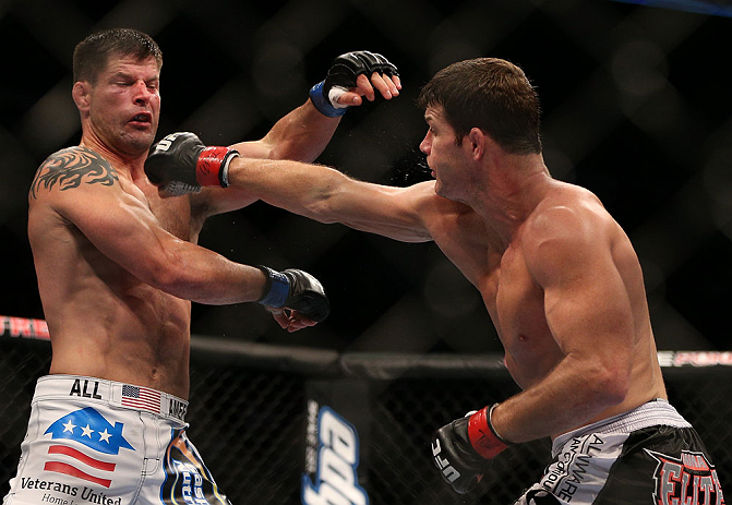 TORONTO, CANADA - SEPTEMBER 22: (R-L) Michael Bisping punches Brian Stann during their middleweight bout at UFC 152 inside Air Canada Centre on September 22, 2012 in Toronto, Ontario, Canada. (Photo by Josh Hedges/Zuffa LLC/Zuffa LLC via Getty Images)